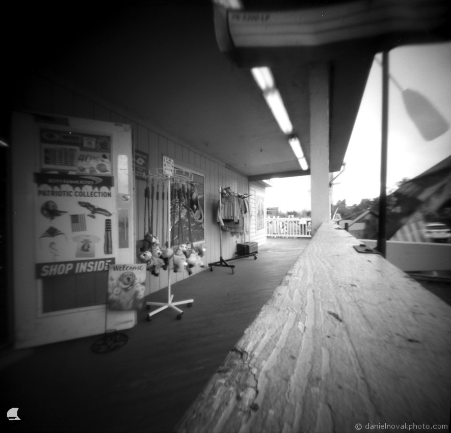 Shop Inside, Duck, NC. Pinhole Photography from OBX 2025. terraPIN ACME pinhole camera, Kodak T-Max 100 black and white negative film, D-23 developer.