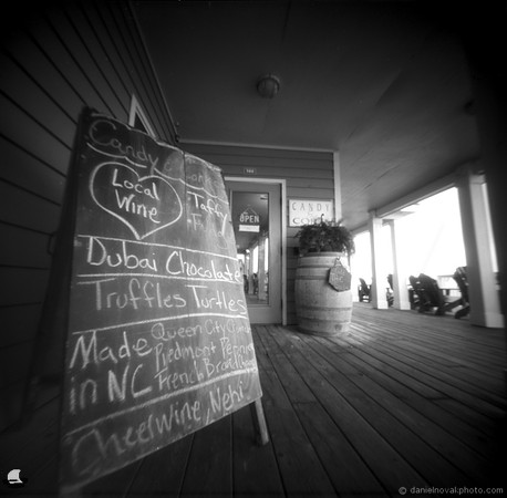 Candy & Corks, Boardwalk Shops, Duck, NC. TerraPin ACME 3d-printed pinhole camera, Kodak T-Max 100 black and white negative film. replenished D-23 developer.