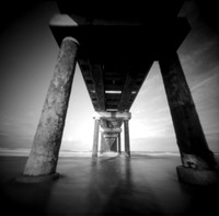 Through the Pier, US Army Corps of Engineers Field Research Facility Pier, Duck, NC. TerraPin ACME 3d-printed pinhole camera, Kodak T-Max 100 black and white negative film. replenished D-23 developer.