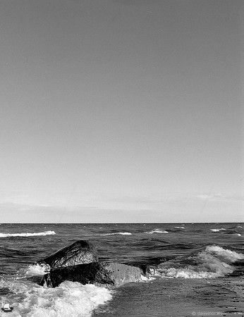 Rocks, Water, Sky, Lake Erie Shore. Medium format Mamiya RB67, Ultrafine Xtreme UXF 400 black and white film, D-23 negative developer.