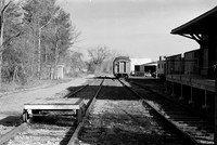 Tracks behind the Train Depot, Orchard Park, NY. Photographed with a 35mm Pentax Spotmatic F on Ilford XP2 black and white film.