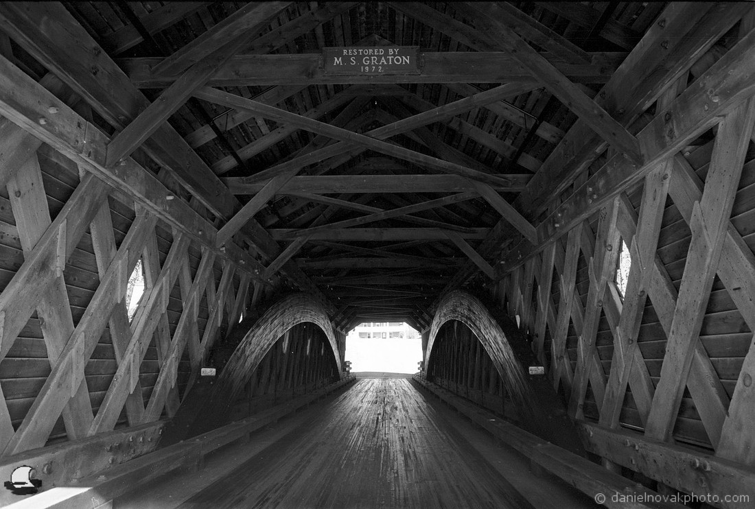 Inside the Newfield Covered Bridge, a roadtrip surprise on black and white film.