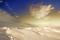 Lake Erie frozen solid with ice and snow formations near Hamburg - Buffalo, NY beach.