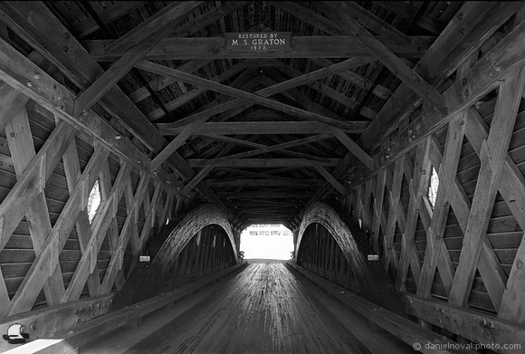 Inside the Newfield Covered Bridge. Photographed with a 35mm Nikon FE2 on Fuji Acros II black and white negative film. and developed in D-23 developer.