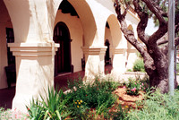 Colonnade Arches, Santa Ines Mission, Solvang, California. Photographed with a.vintage 35mm Olympus Stylus Zoom 140 camera on Kodak Colorplus 200 color negative film. Developed in C-41.