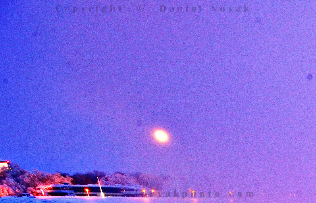 Dust on a digital camera sensor - dark dust spots highlighted in high contrast and high pass toning.