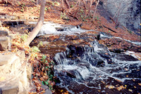 Cascades of Cascadilla Creek, Ithaca, NY. Photographed with a vintage 35mm Minolta Maxxum 5 camera on Kodak Colorplus 200 color negative film. Developed in C-41.