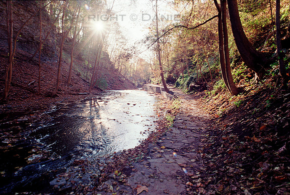 Sunset over Cascadilla Creek, Ithaca, NY. Photographed with a vintage 35mm Minolta Maxxum 5 camera on Kodak Colorplus 200 color negative film. Developed in C-41.