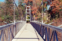 Suspension Bridge over Fall Creek, Ithaca, NY. Photographed with a vintage 35mm Minolta Maxxum 5 camera on Kodak Colorplus 200 color negative film. Developed in C-41.