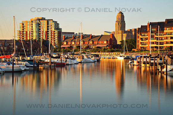 Buffalo City Hall Reflection in the Erie Basin Marina at Sunset in Summer. A peaceful long exposure.