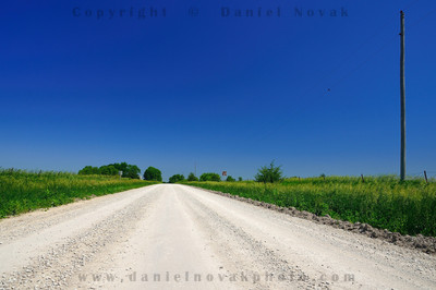 Chasing covered bridges of Madison County.  dirt road near Winterset, Iowa (IA).