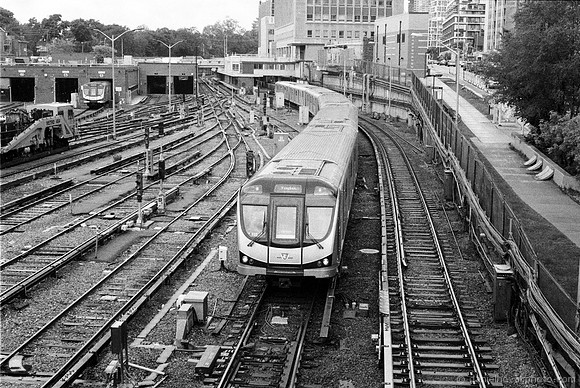Subway Tracks & Train, Midtown Toronto, Canada. 35mm Nikon FE2, Agent Shadow 400, D-23 developer.