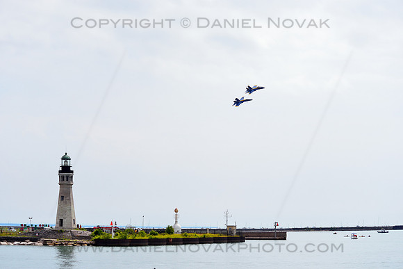 Two US Navy Blue Angels F-18 Super Hornets over Buffalo Main Light
