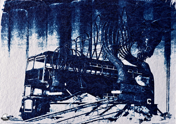 Steel sculpture of a bison in front of an old double-decker bus and a grain elevator for the background. An original hand-made 5" x 7" cyanotype print from Buffalo, NY.
