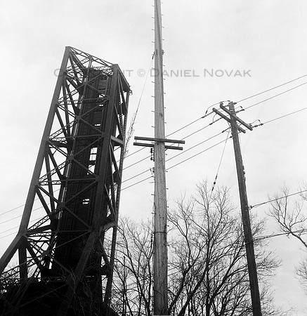 Triplets, a raised railroad bascule draw bridge in Buffalo, NY and utility poles