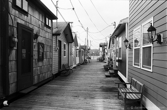 Down the Pier in Black & White, Boathouses of Canandaigua City Pier