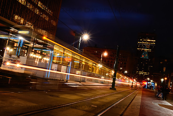 Buffalo Main Street Train at dusk during blue hour with natural and artificial lights balanced.