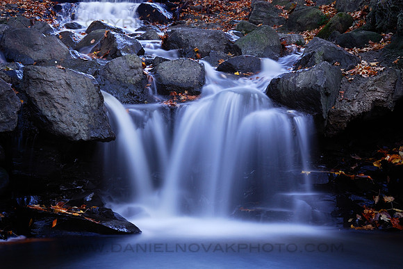 A waterfall behind the dam at Green Lake, Orchard Park - Buffalo, New York (NY).