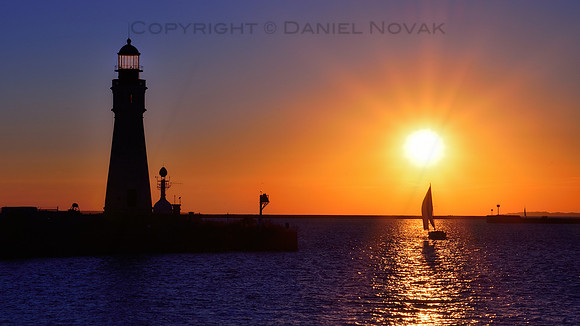 Boating / Sailing under a Partial Solar Eclipse, Buffalo Main Light lighthouse, Erie Basin Marina, October 23, 2014.