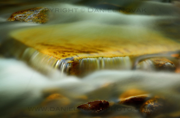 As Time and Water Pass, Water Flow over a Rock in a Small Creek in Letchworth State Park,