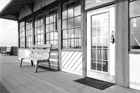 The Pier Bar & Grill, Fairhope Municipal Pier, Alabama. 35mm Nikon FE camera on Ilford Delta 100 black and white negative film.