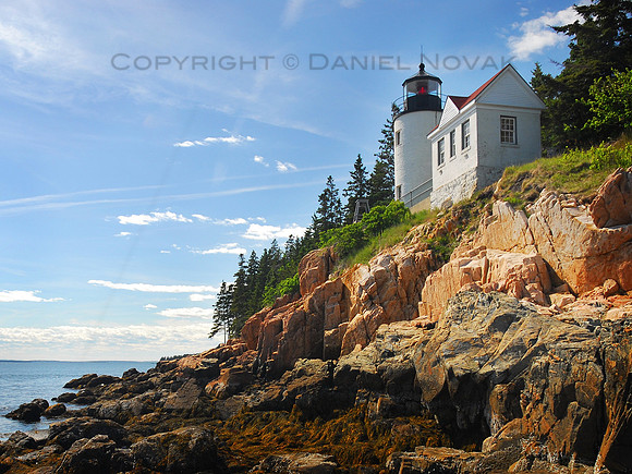 Daytime photo of the Bass Harbor Head Lighthouse at low tide, Maine (ME).