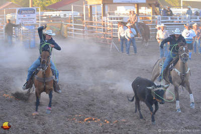 Head in, Heels to Go, Roping at the Rimrock Rodeo, Fruita, Colorado.
