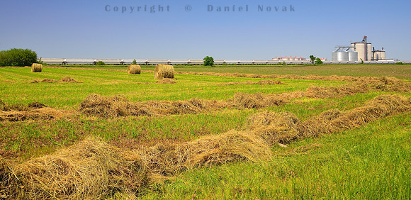 Rural Iowa (IA). Hay, hay bales, train - soak in the Midwest while driving through Adair, Casey, Menlo, Stuart and Dexter.