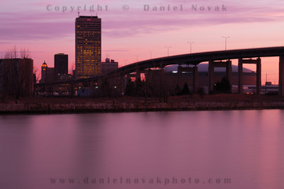 Time can make quite a difference. Buffalo skyline and Skyway at dawn, no reflection.